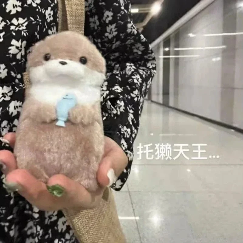 Neue 11 cm Otterpuppe Niedliche kleine Otter kleine Tierplüschtier Niedliche Internet-Rotwind-Minipuppe Tischdekoration Weihnachtsgeschenk