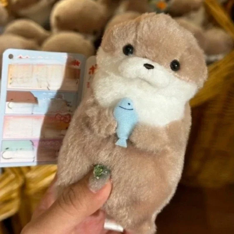 Neue 11 cm Otterpuppe Niedliche kleine Otter kleine Tierplüschtier Niedliche Internet-Rotwind-Minipuppe Tischdekoration Weihnachtsgeschenk