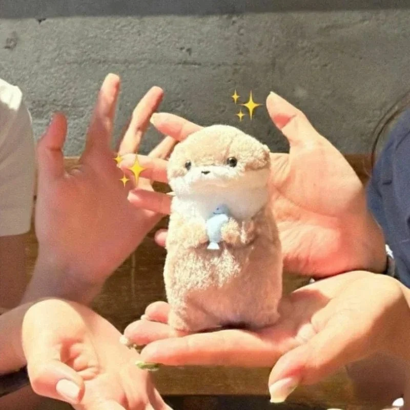 Neue 11 cm Otterpuppe Niedliche kleine Otter kleine Tierplüschtier Niedliche Internet-Rotwind-Minipuppe Tischdekoration Weihnachtsgeschenk