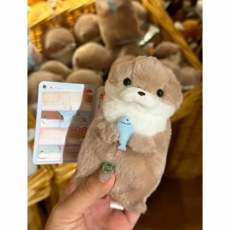 Neue 11 cm Otterpuppe Niedliche kleine Otter kleine Tierplüschtier Niedliche Internet-Rotwind-Minipuppe Tischdekoration Weihnachtsgeschenk