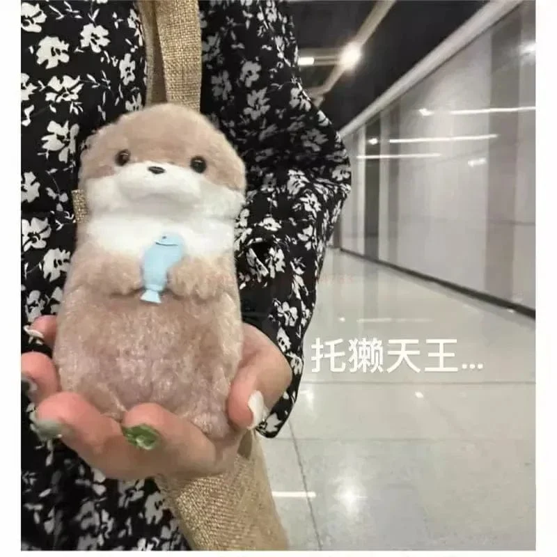 Neue 11 cm Otterpuppe Niedliche kleine Otter kleine Tierplüschtier Niedliche Internet-Rotwind-Minipuppe Tischdekoration Weihnachtsgeschenk