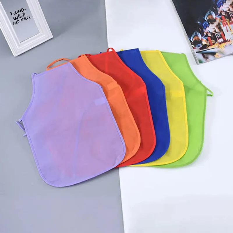 Kinderschürze, einfarbig, bunt, Vliesstoff, für Kinder, Malen, Zeichnen, Spielzeug, Schürzen, Basteln, Spielset, Backen, Kochen, Latzschürze