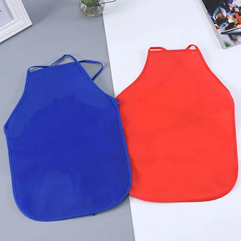 Kinderschürze, einfarbig, bunt, Vliesstoff, für Kinder, Malen, Zeichnen, Spielzeug, Schürzen, Basteln, Spielset, Backen, Kochen, Latzschürze