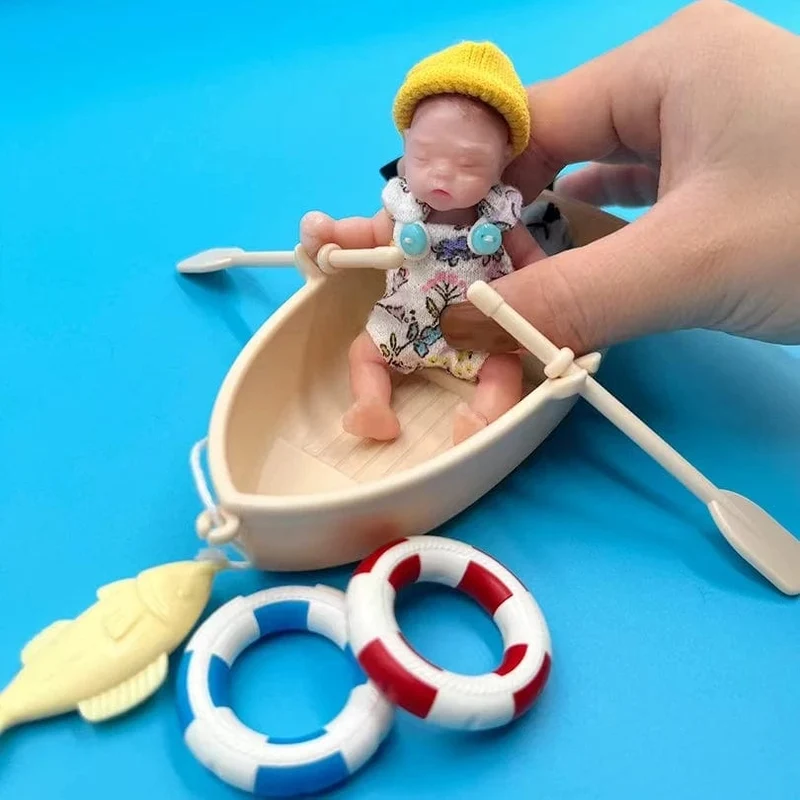 8 cm süßes Mini-Reborn-Mädchen aus Silikon mit 2 Sets Mini-Outfits für jedes Reborn-Baby, flexible Puppe mit weichem Griff