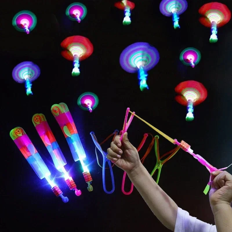1/10/30/50 stücke Erstaunliche Licht Spielzeug Pfeil Rakete Hubschrauber Fliegen Spielzeug LED Licht Spielzeug Party Spaß Geschenke Gummiband Katapult