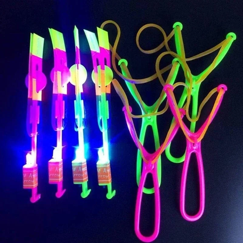 1/10/30/50 stücke Erstaunliche Licht Spielzeug Pfeil Rakete Hubschrauber Fliegen Spielzeug LED Licht Spielzeug Party Spaß Geschenke Gummiband Katapult