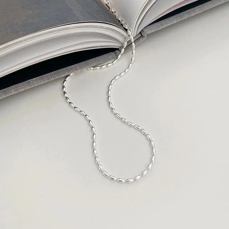Halskette aus 925er Sterlingsilber mit schlichten geometrischen Perlen, glänzende und zarte Schlüsselbeinkette für Damenmode-Juwelier