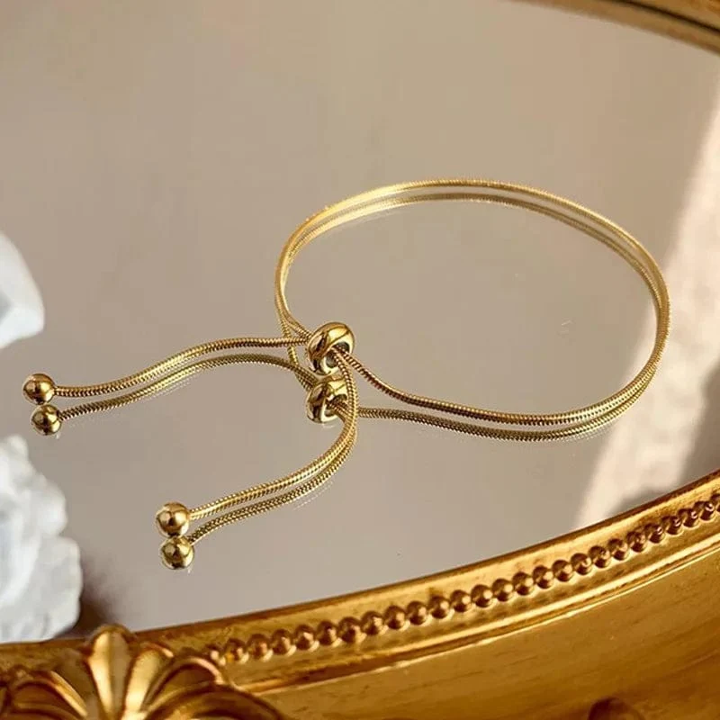 ANENJERY 316L Edelstahl verstellbares Zugarmband Fußkettchen weibliche Ins Kalter Wind einfaches Schlangenknochenkettenarmband