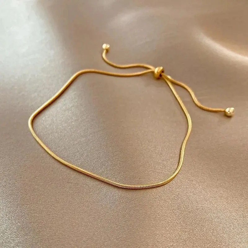ANENJERY 316L Edelstahl verstellbares Zugarmband Fußkettchen weibliche Ins Kalter Wind einfaches Schlangenknochenkettenarmband