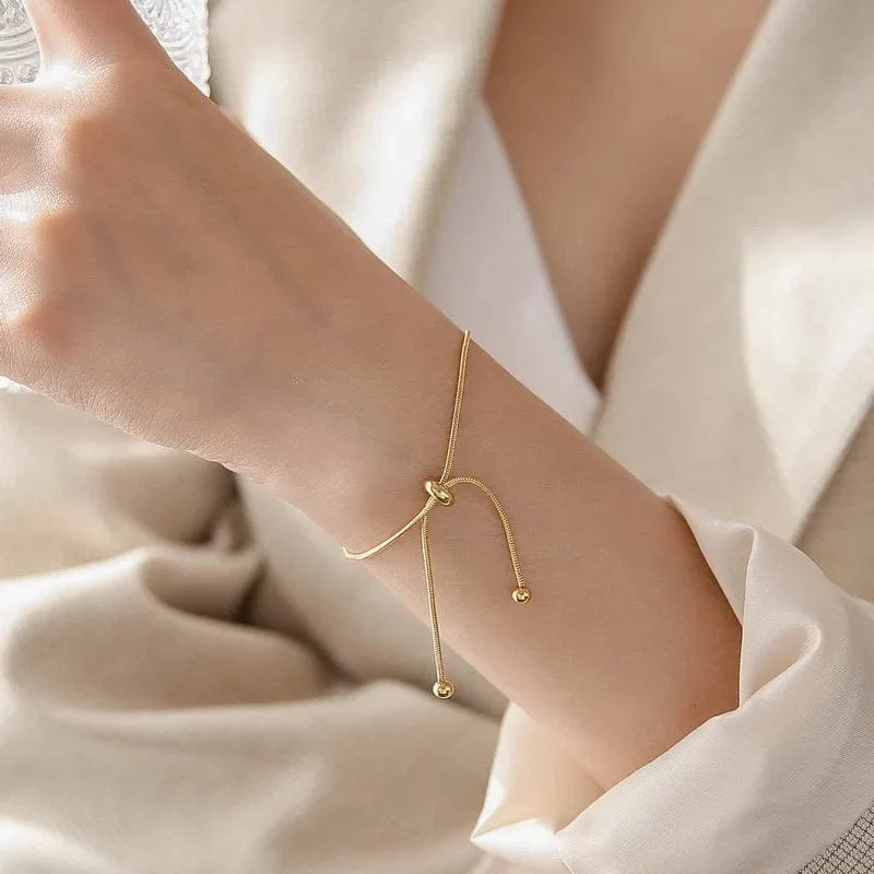 ANENJERY 316L Edelstahl verstellbares Zugarmband Fußkettchen weibliche Ins Kalter Wind einfaches Schlangenknochenkettenarmband
