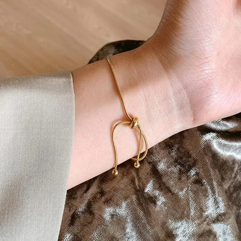 ANENJERY 316L Edelstahl verstellbares Zugarmband Fußkettchen weibliche Ins Kalter Wind einfaches Schlangenknochenkettenarmband