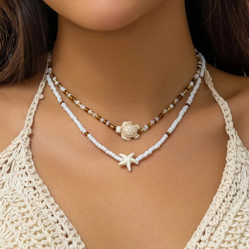KunJoe Halsketten-Set mit Reisperlen in verschiedenen Farben und Seestern-Anhänger für Damen und Herren, modischer Strand-Halsreif, Schlüsselbeinkette