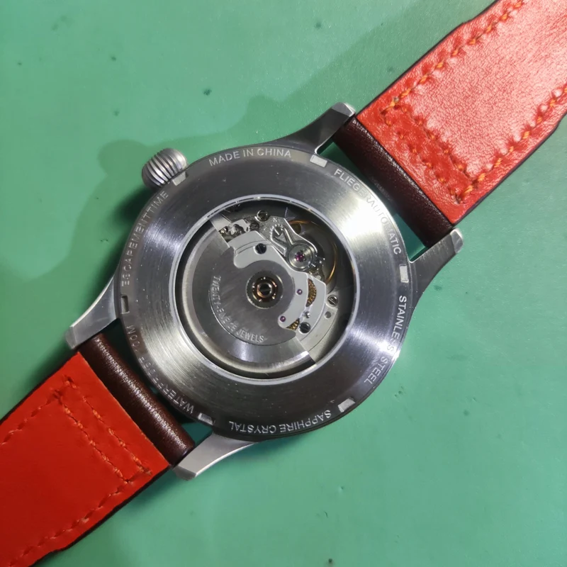 【Hemmungszeit】 Fliegeruhr mit automatischem PT5000-Uhrwerk, schwarzem Zifferblatt vom Typ B oder Typ A und 40-mm-Gehäuse, wasserdicht bis 100 m.