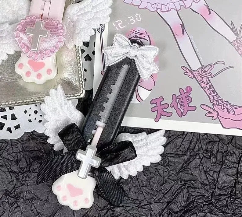 Niedliches Allzweckmesser mit Katzenpfote und reizendem Flügel im Bowknot-Stil, Kartonschneider, Briefumschlagöffner, Postmesser, Schul- und Bürobedarf