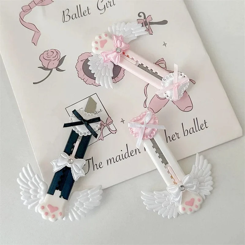 Niedliches Allzweckmesser mit Katzenpfote und reizendem Flügel im Bowknot-Stil, Kartonschneider, Briefumschlagöffner, Postmesser, Schul- und Bürobedarf
