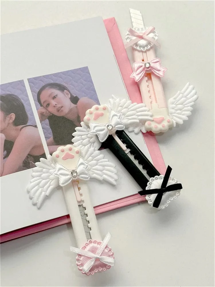 Niedliches Allzweckmesser mit Katzenpfote und reizendem Flügel im Bowknot-Stil, Kartonschneider, Briefumschlagöffner, Postmesser, Schul- und Bürobedarf
