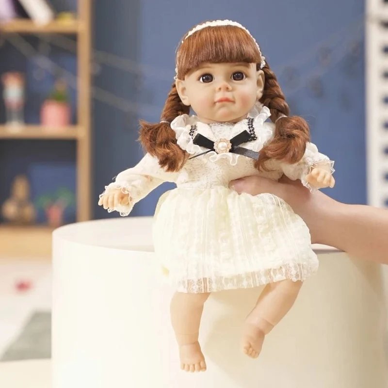 14 Zoll neue lebensechte Puppe 35CM Stimme Mädchen Bebe Baby mit modischer Kleidung glatte weiche Haut Vinylkopf Gliedmaßen Baumwollkörper Kindergeschenk