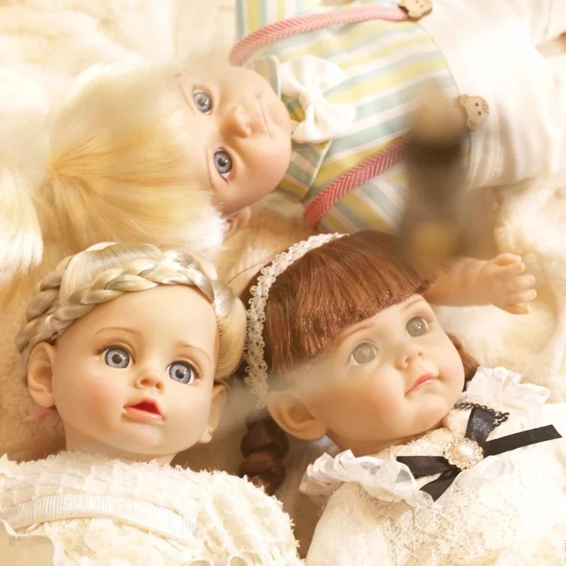14 Zoll neue lebensechte Puppe 35CM Stimme Mädchen Bebe Baby mit modischer Kleidung glatte weiche Haut Vinylkopf Gliedmaßen Baumwollkörper Kindergeschenk