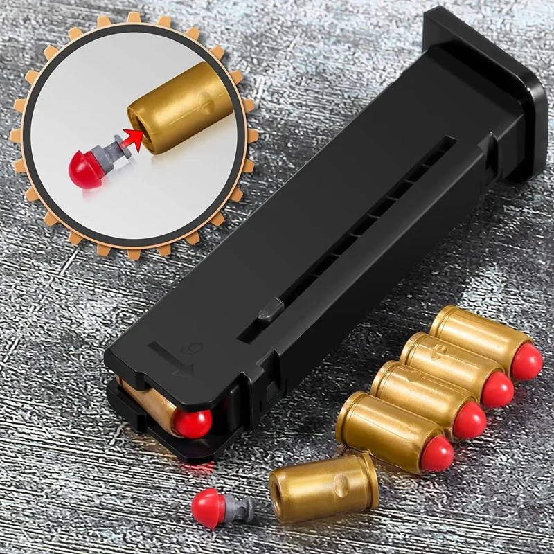 Neue schwarze Spielzeugpistole. Luftpistole mit automatischem Patronenauswurf und weichen Kugeln, Maschine zum Aufhängen von leeren Patronen, automatisches Laden