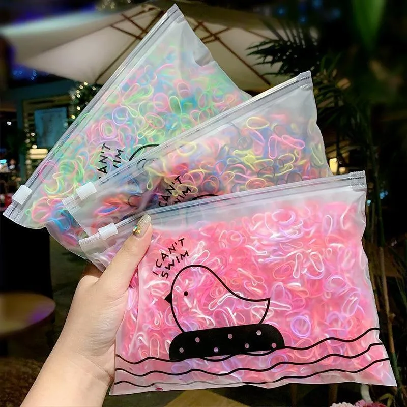 1000 Stück / Packung Mädchen Bunte kleine Einweg-Gummibänder Kinder Pferdeschwanzhalter Elastische Haarbänder Krawatten Mode Haarschmuck