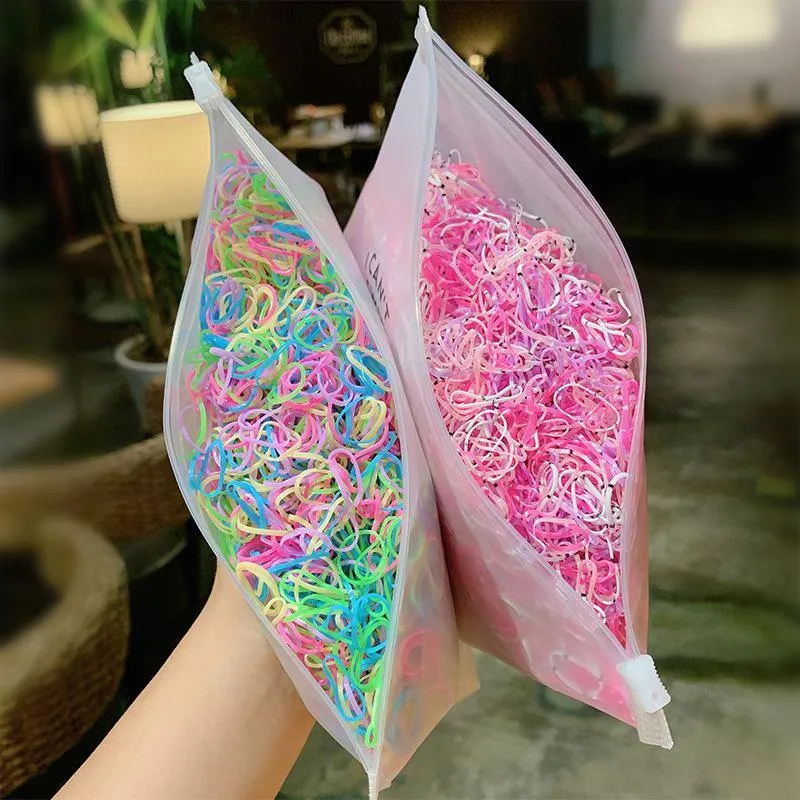 1000 Stück / Packung Mädchen Bunte kleine Einweg-Gummibänder Kinder Pferdeschwanzhalter Elastische Haarbänder Krawatten Mode Haarschmuck