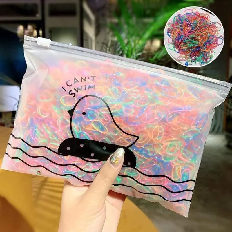 1000 Stück / Packung Mädchen Bunte kleine Einweg-Gummibänder Kinder Pferdeschwanzhalter Elastische Haarbänder Krawatten Mode Haarschmuck