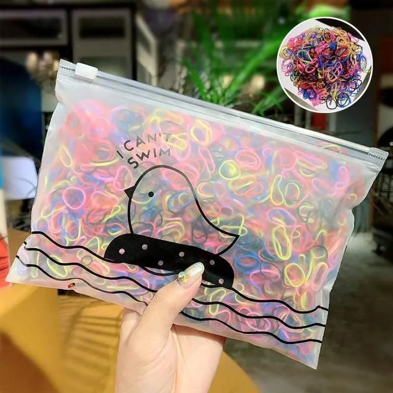 1000 Stück / Packung Mädchen Bunte kleine Einweg-Gummibänder Kinder Pferdeschwanzhalter Elastische Haarbänder Krawatten Mode Haarschmuck