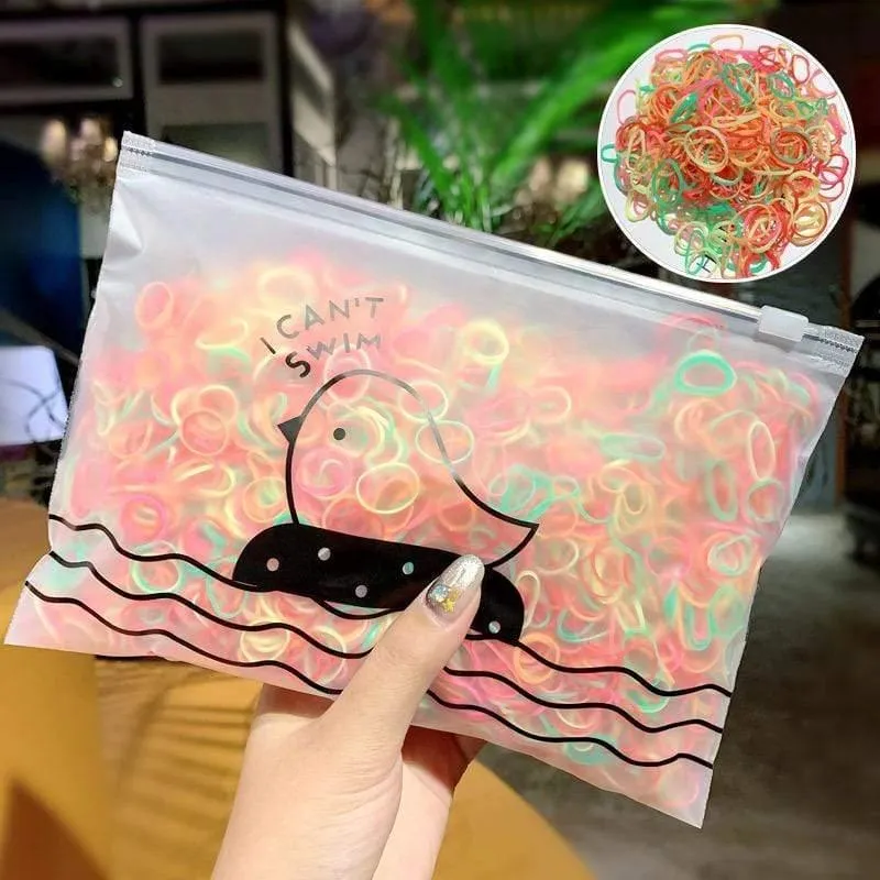 1000 Stück / Packung Mädchen Bunte kleine Einweg-Gummibänder Kinder Pferdeschwanzhalter Elastische Haarbänder Krawatten Mode Haarschmuck