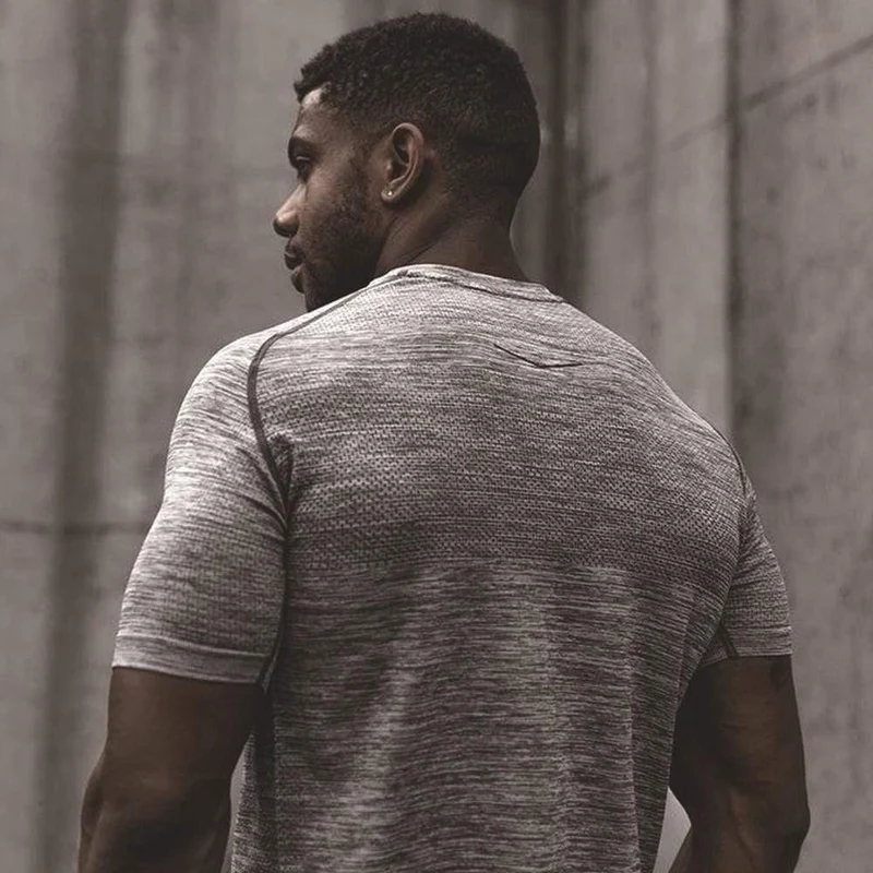 Kompression Schnelltrocknende Hemden Herren Turnhallen Fitness T-Shirt Superelastic Skinny T-Shirt Tops Sommer Jogger Crossfit Markenkleidung