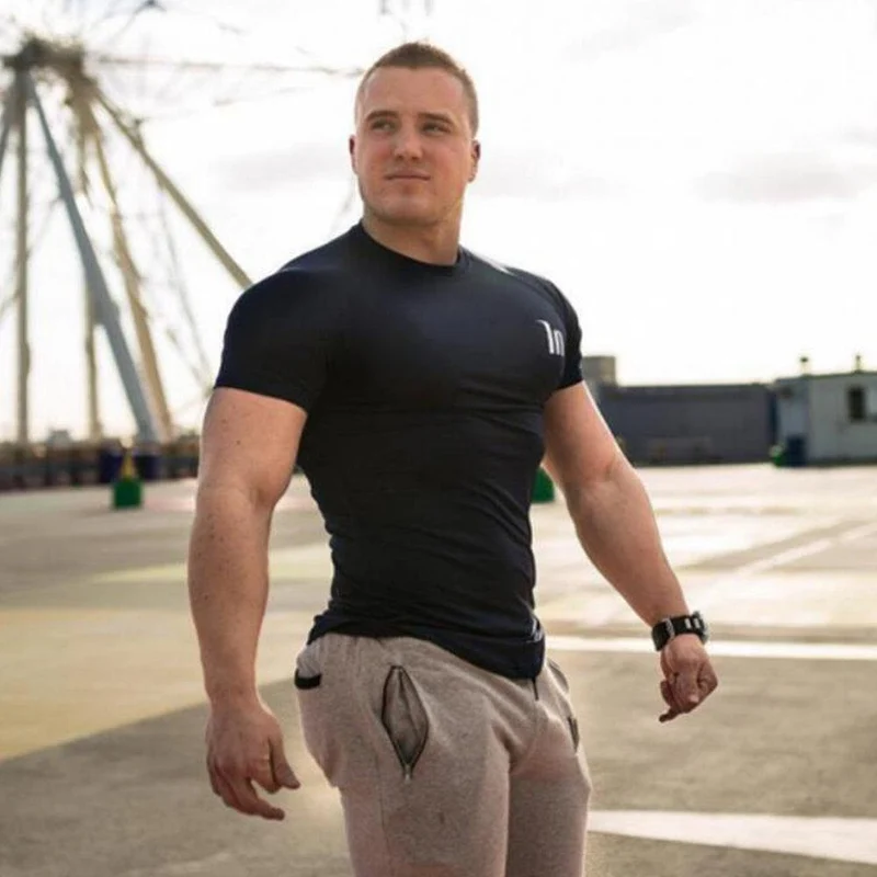 Superelastic Schnelltrocknendes T-Shirt Herren Fitness Fitness Bodybuilding T-Shirt Skinny T-Shirt Tops Sommer Männlich Jogger Workout Kleidung