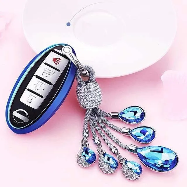 Weiche TPU Autoschlüsselhülle Autoschlüsselschutzhülle für Nissan Infiniti QX50 Q50L Tears of the Sky Künstlicher Kristallanhänger