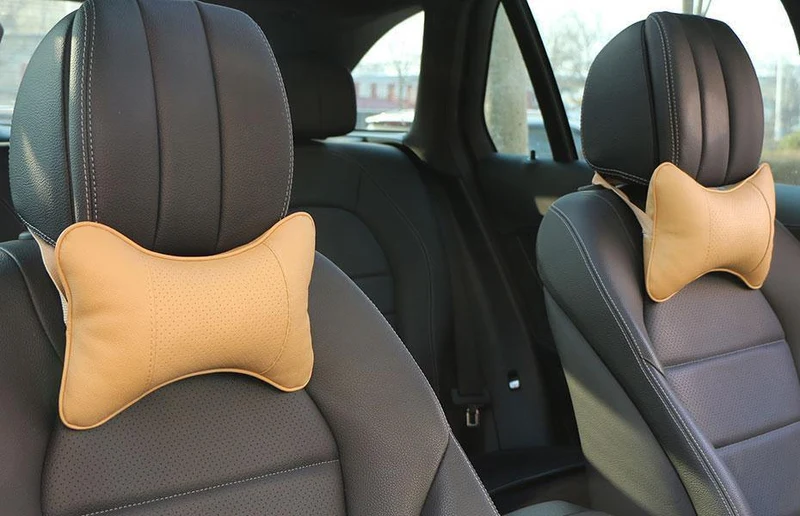 2 Stück Kunstleder-Autokissen zum Schutz Ihres Nackens/Auto-Kopfstütze, lochgrabendes Design/Autozubehör, Sicherheits-Nackenkissen