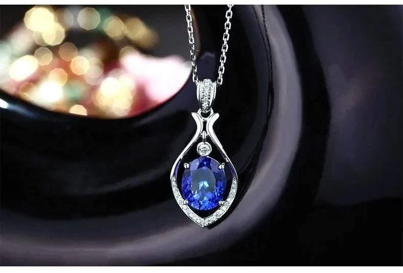 18 kt/750 Weißgold 3.09 ct natürlicher blauer Tansanit AAA 0.13 ct Vollschliff Diamant Verlobung Edelstein Anhänger Schmuck