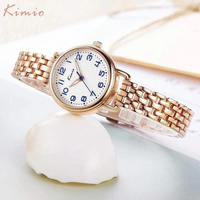 Frauenquarzuhren kleiden analoge Uhrart und weisearmbanduhrgoldlegierungsfallarmbanduhr Geschenkuhr des heißen Mädchens