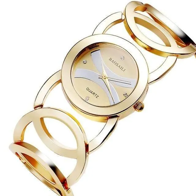 Gold überzogene Kreis-Bügel-Edelstahl-Rückseite, die Frauen-Armband-Uhr-Art- und Weisearmbanduhr shinning ist
