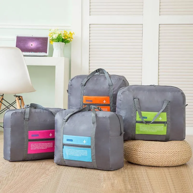 Mode wasserdichte reisetasche große kapazität tasche frauen nylon falttasche unisex gepäck reisetaschen