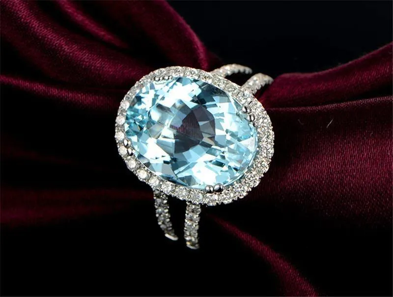 5.39ct Big Oval Topaz Halo Ring Echter himmelblauer Edelstein Topaz Ring 925 Sterling Silber Verlobungsring