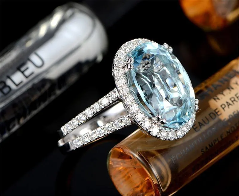 5.39ct Big Oval Topaz Halo Ring Echter himmelblauer Edelstein Topaz Ring 925 Sterling Silber Verlobungsring