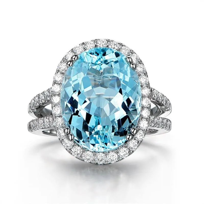 5.39ct Big Oval Topaz Halo Ring Echter himmelblauer Edelstein Topaz Ring 925 Sterling Silber Verlobungsring