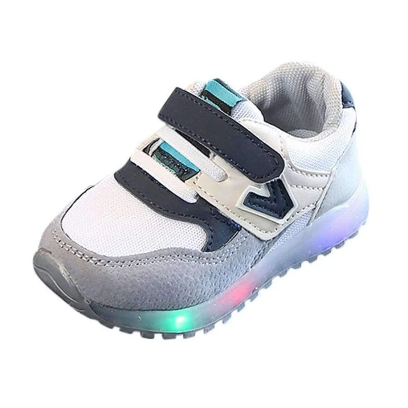 Modische Jungen- und Mädchenschuhe aus Leder. Coole leuchtende Turnschuhe für Kleinkinder, Lauflernschuhe, elegante, lässige Babyschuhe